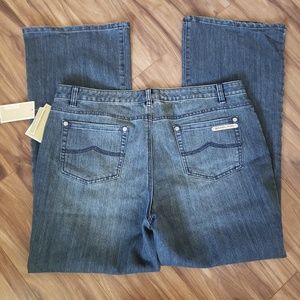 Brand new Michael Kors stretch medium wash jeans